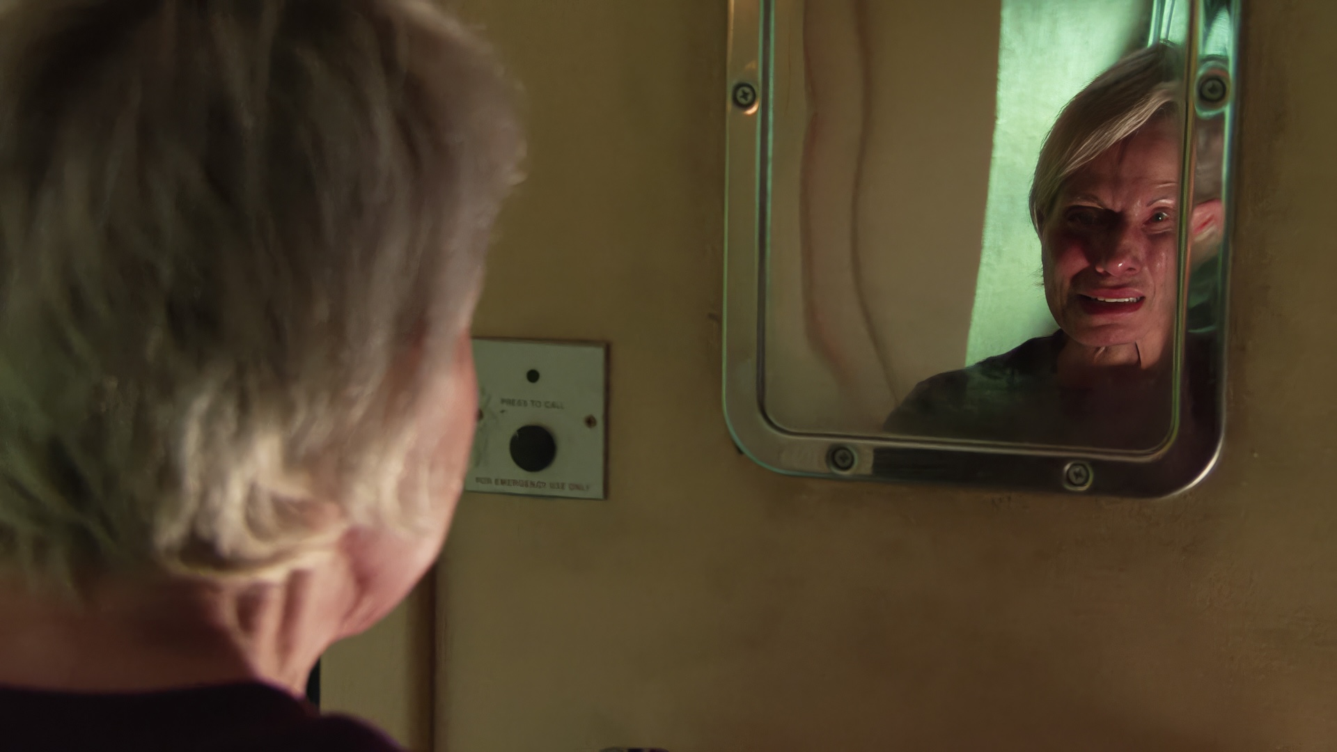 Coronation Street's Debbie staring into a mirror