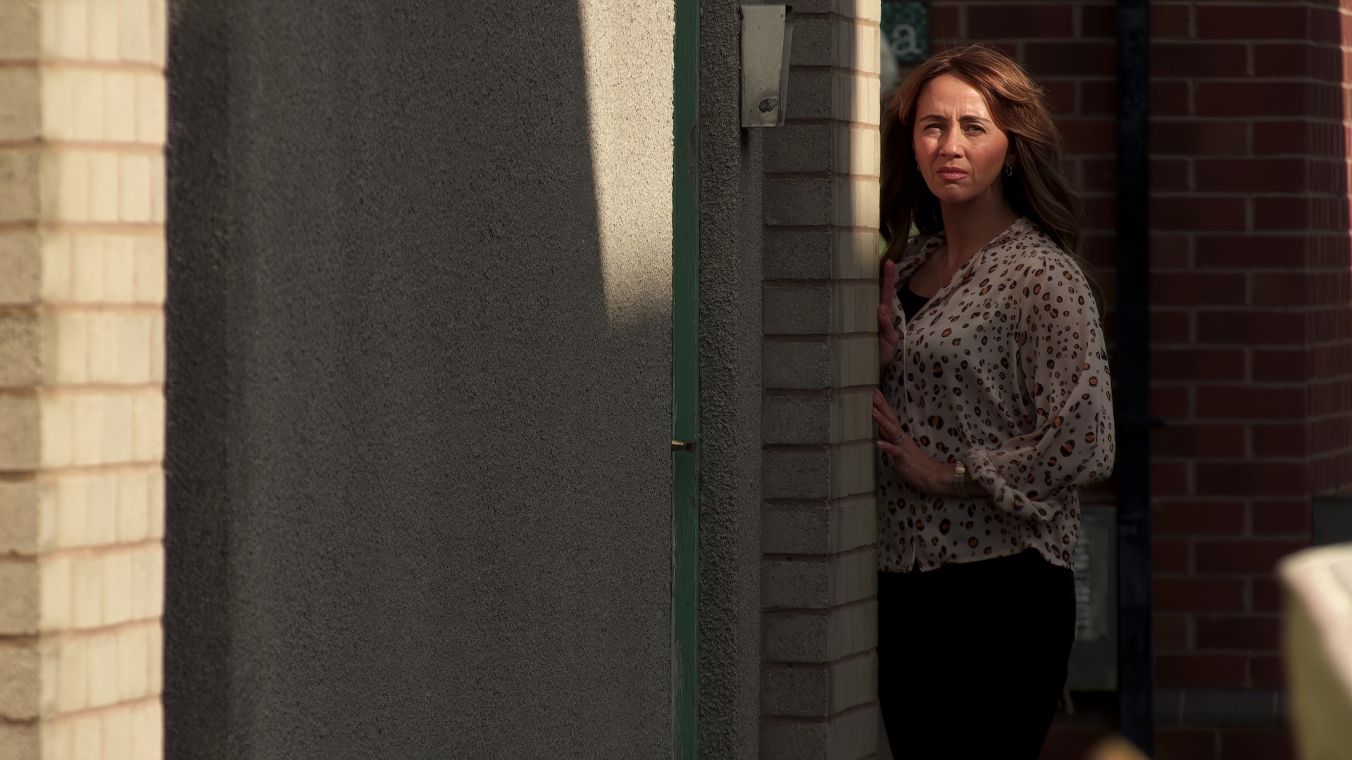 Coronation Street's Maria lurking behind a wall